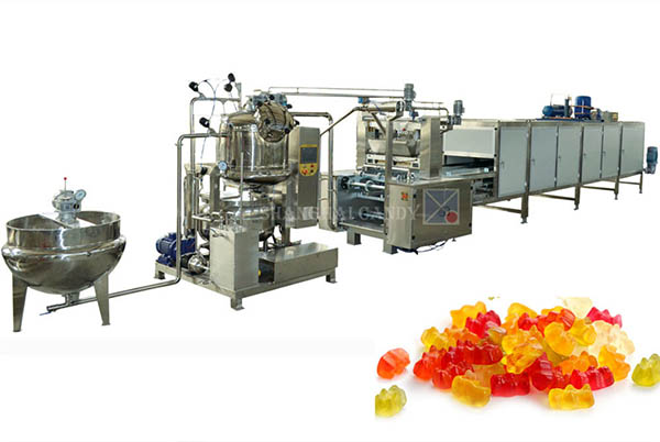 Starchless depositing machine for gummy candy production