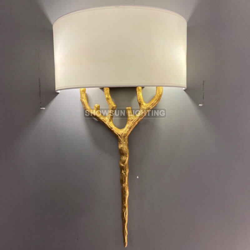 Lampada da parete moderna in ottone