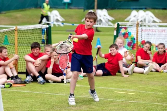 Children’s tennis: red ball, orange ball, green ball