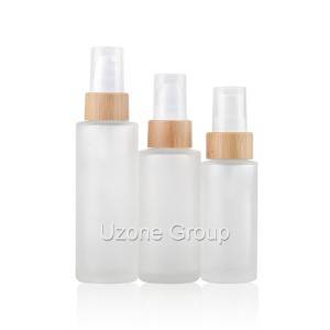 Clear frosted glass bottle with bamboo collar pump/sprayer