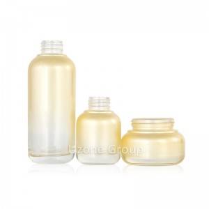 Elegant glass cream jar and serum bottles with domed bottom