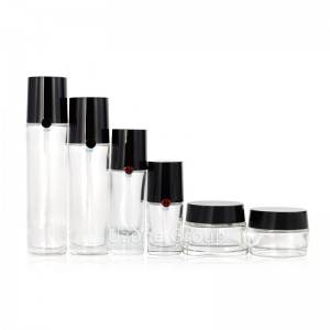 Clear oval glass bottle and jar skin care set