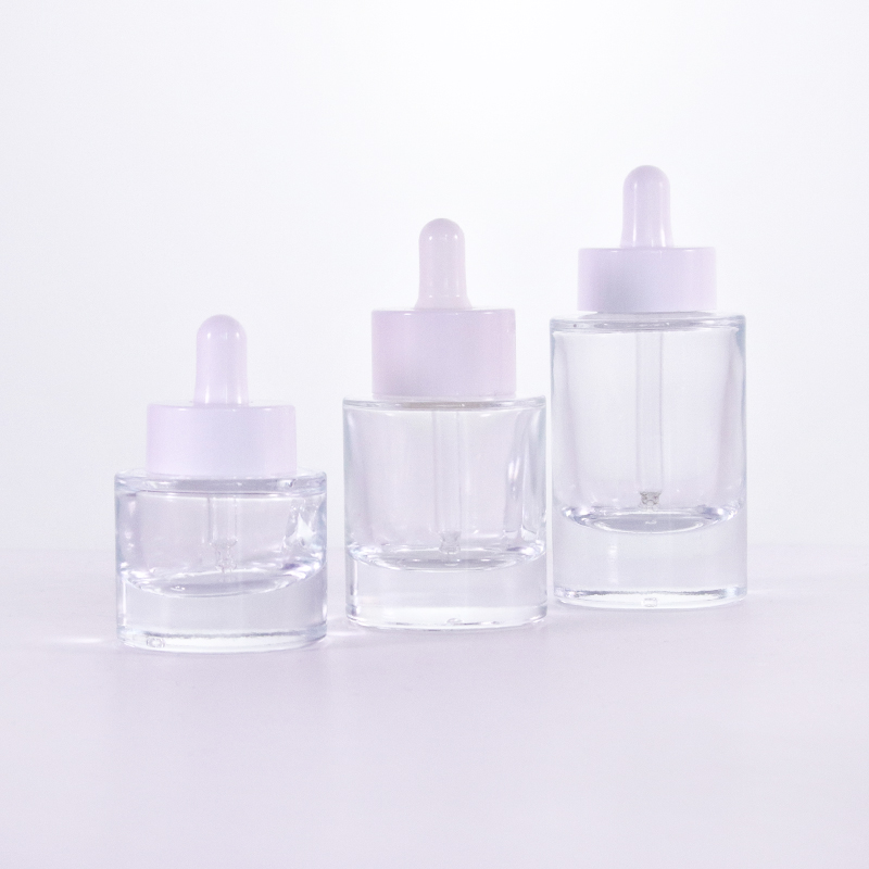 Luxury thick bottom clear glass serum bottle with white dropper Featured Image