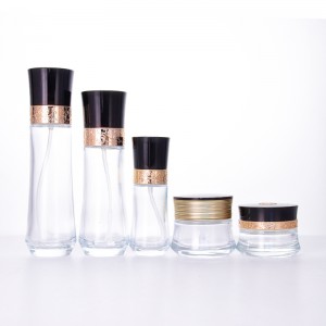 Manufacturing Companies for 10 Oz Cosmetic Jars - Wholesale luxury transparent glass bottle and jar with beautifully carved black cap for skincare packaging set – Uzone