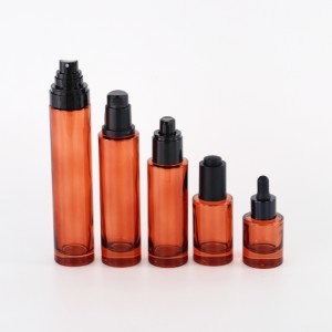 Tall and slim amber glass bottles and jar for skin care package
