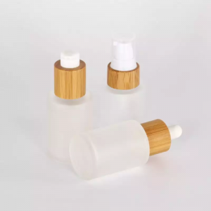 In stock 30ml 50ml 100ml 150ml Round Glass Lotion Bottle with bamboo pump dropper spray Wooden Bamboo cap