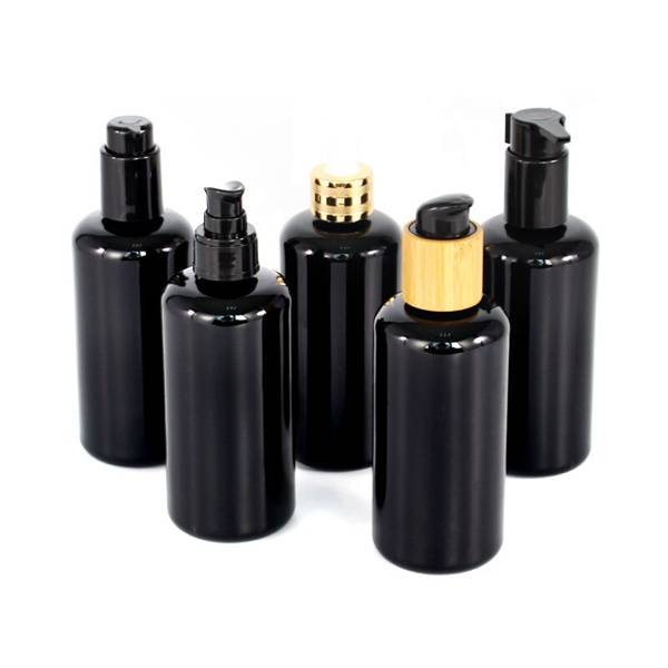 200ml opaque black round shoulder glossy glass lotion bottle Featured Image