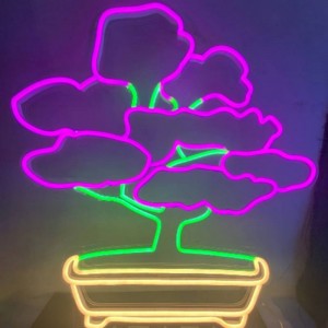 Syarikat vasten tanda neon tumbuhan3