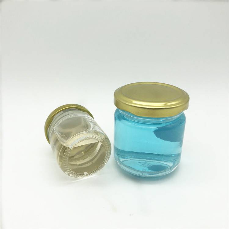 Candy storage round glass jar for jam or dry fruit with metal cap