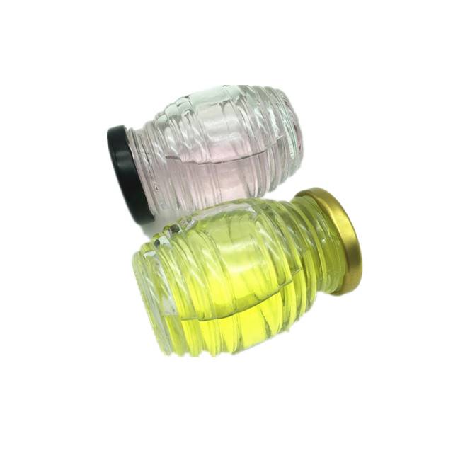 Exquisite thread design honeycomb shape 100ml honey glass jar with tin lid