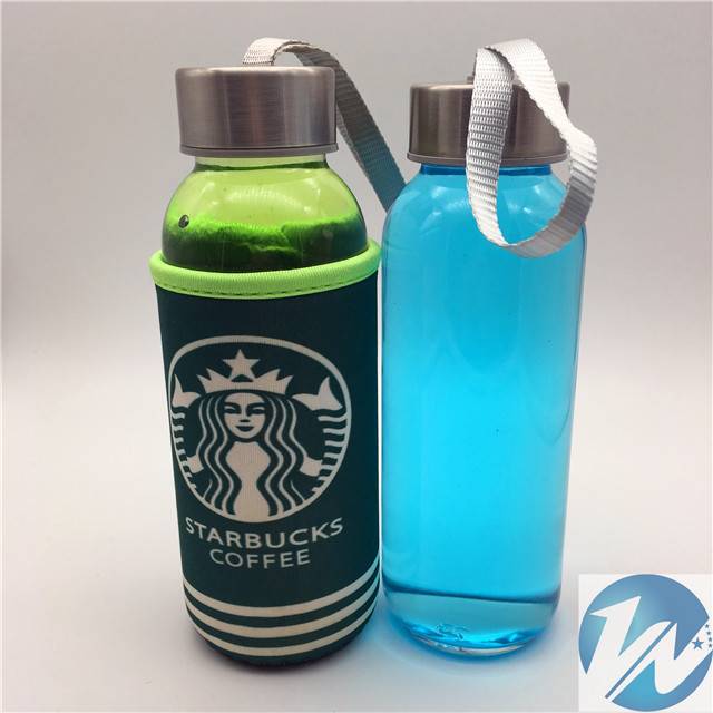 Cylindrical glass water bottle with silicone cover and cup sleeve Featured Image