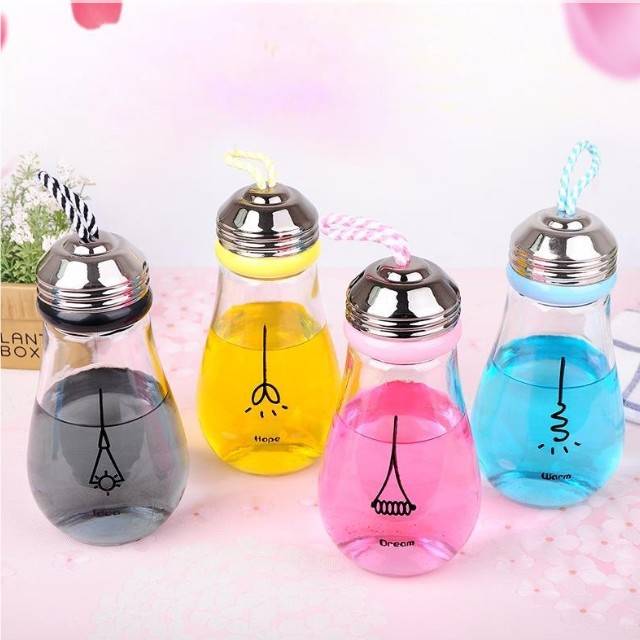 wholesale popular unique light bulb shaped clear empty glass bottles with a cap for drinking packaging