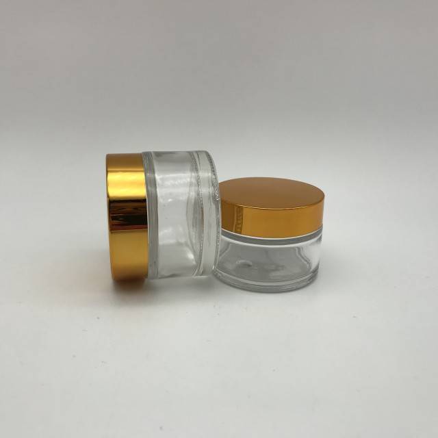 Luxury Short Round 30g 50g Eye Cream Glass Jar With Gold Plastic Screw Lid For Cosmetics Packaging Cheap Little Glass Bottle Featured Image