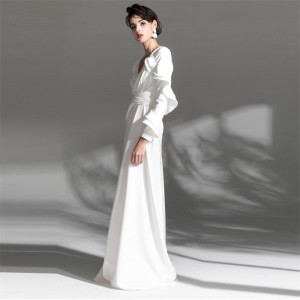 Дизайнерська біла довга весільна сукня з довгим рукавом