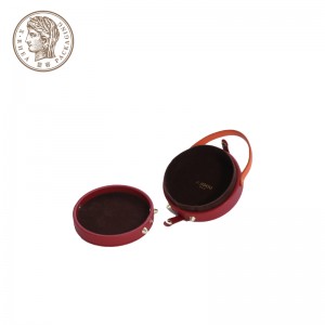 Vlastné dizajnové kruhové luxusné úložné boxy na šperky z PU kože s PU rukoväťou