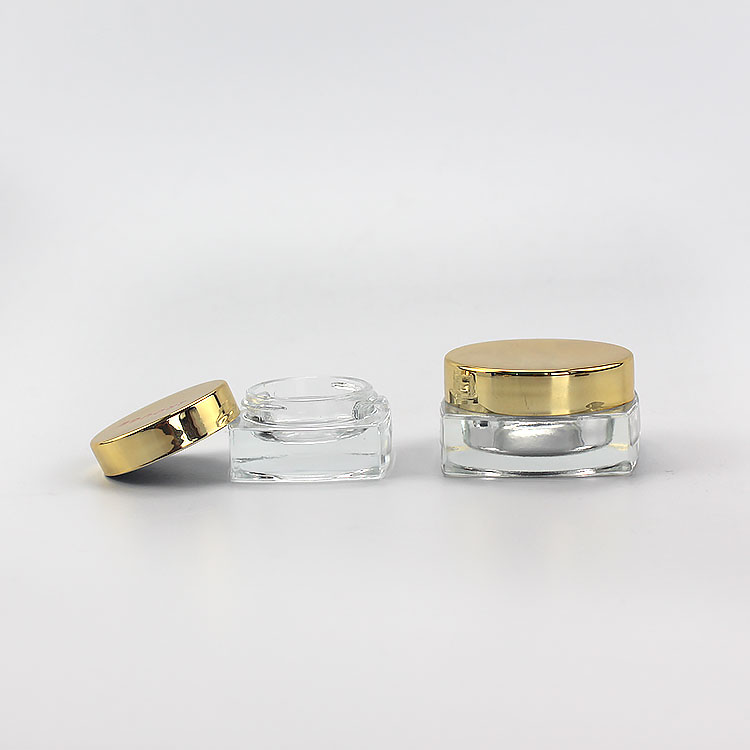 Manufacturer empty square 5ml 15ml eye cream glass jar eye make up jar foundation container with gold lid for sale Featured Image