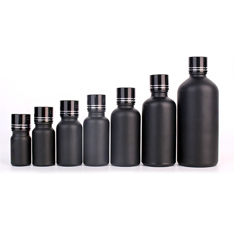 black cosmetic container lotion glass bottles with black fine mist sprayers Featured Image