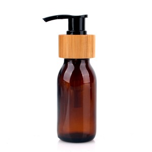 Hot sale amber 60ml round glass lotion bottle with bamboo pump