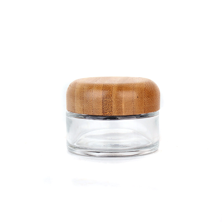 Emballage cosmétique vide de haute qualité pot de crème en verre rond transparent de 50g avec couvercle en bois de bambou