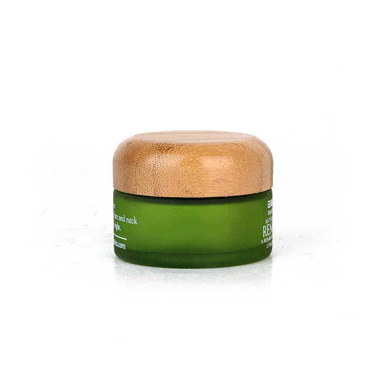 50ml cosmetic packaging frosted green glass cosmetic cream jars with bamboo lid Featured Image