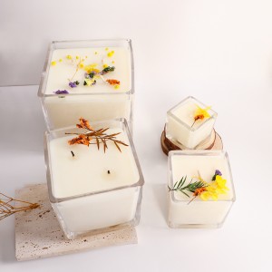 Empty clear square glass candle jars