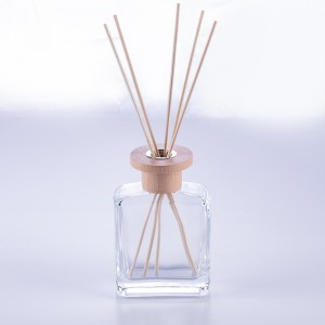 Clear square glass diffuser bottle with wooden cap