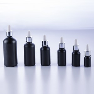Black essential oil glass bottle with dropper