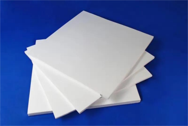At what temperature can the PTFE sheet material be used?