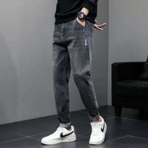 Men’s jeans 2022 new autumn tapered pants men slim feet leisure Harun long pants men wholesale