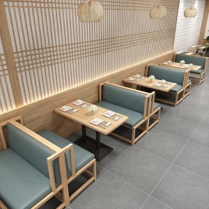 Un ristorante mudernu di divani in pelle mette mobili di caffè