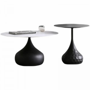Malý kulatý konferenční stolek ze slinutého kamene v moderním stylu